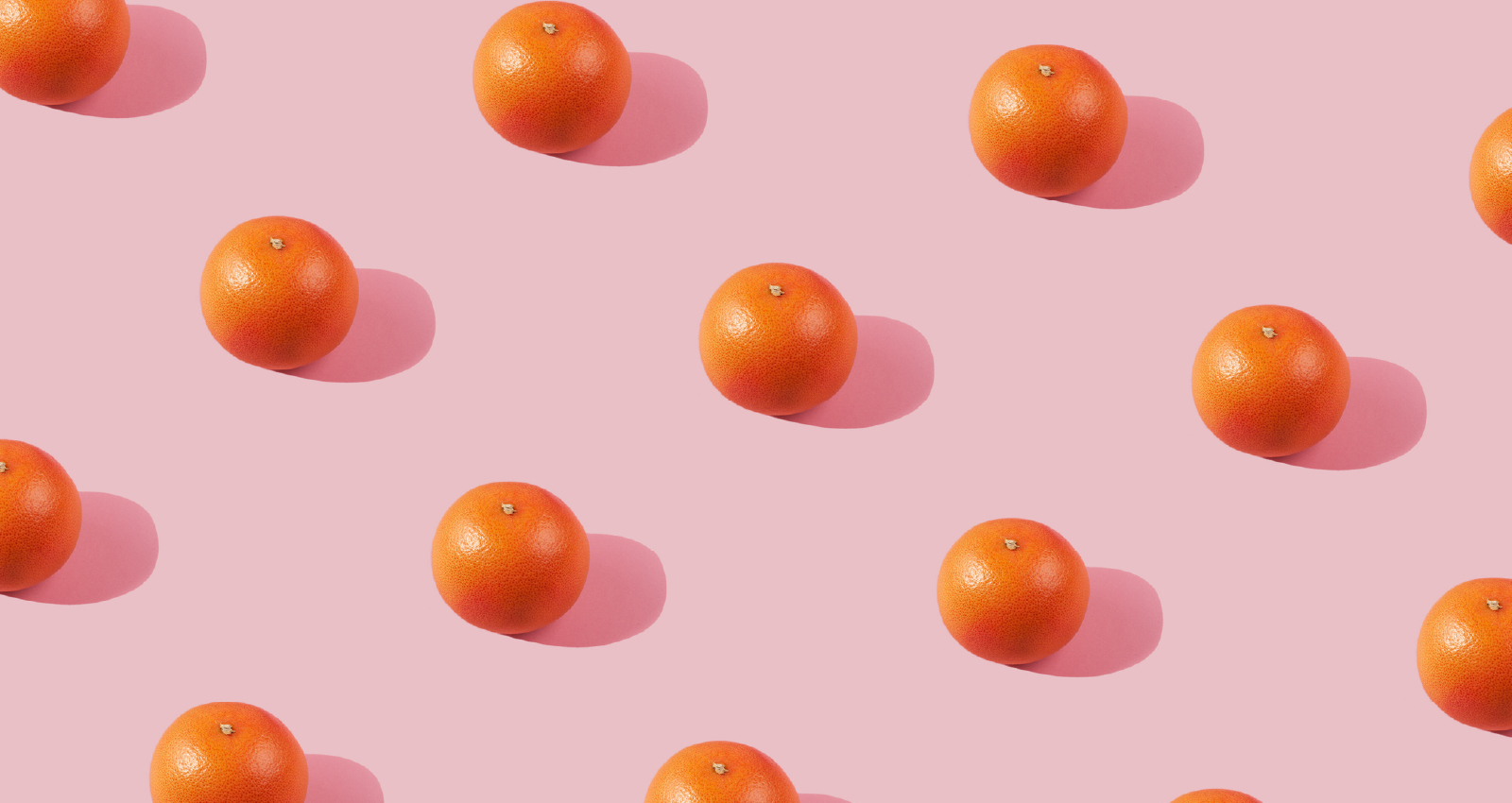 Image of clementine grid on pink background