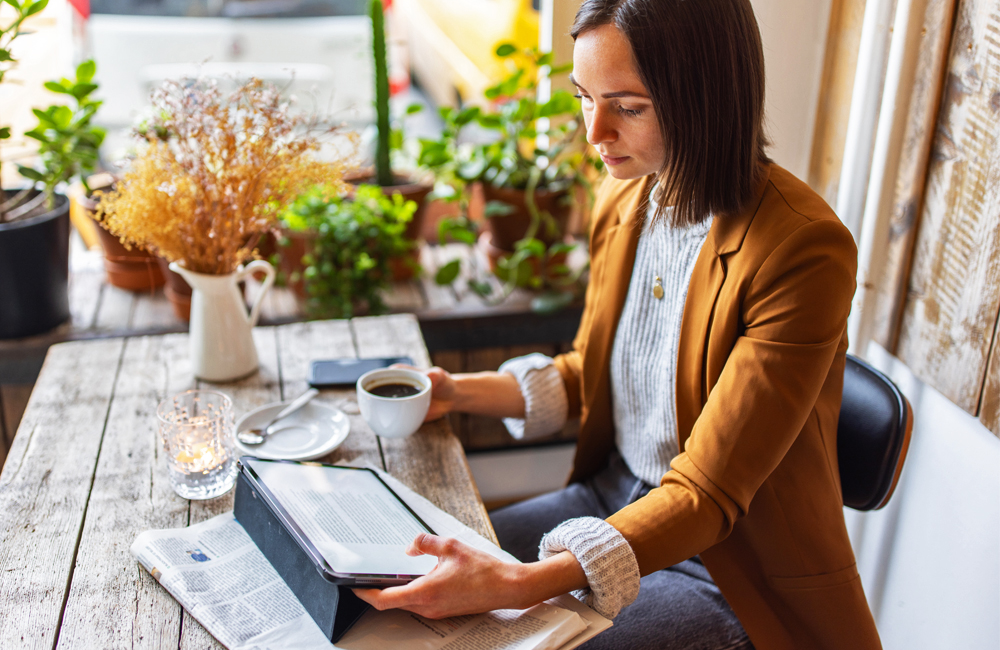 Woman reading article on iPad