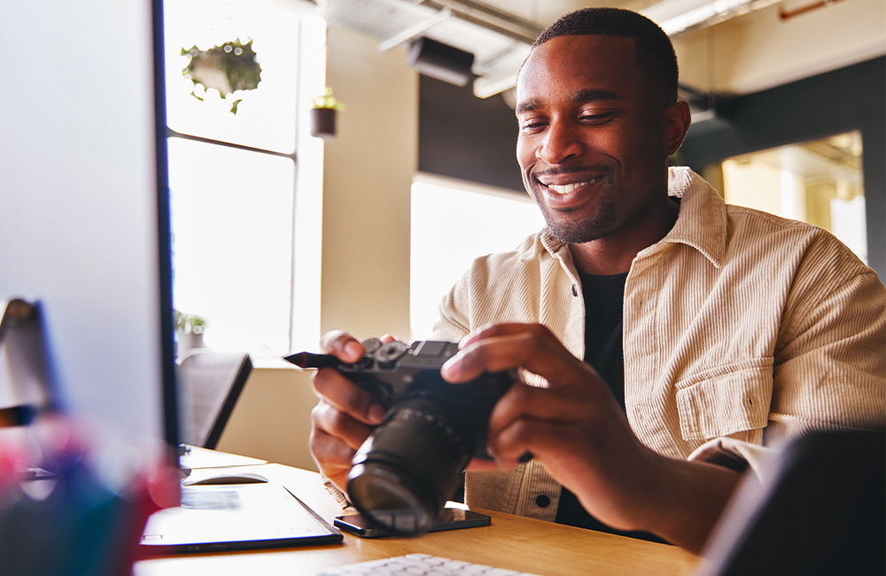 Man checking his camera