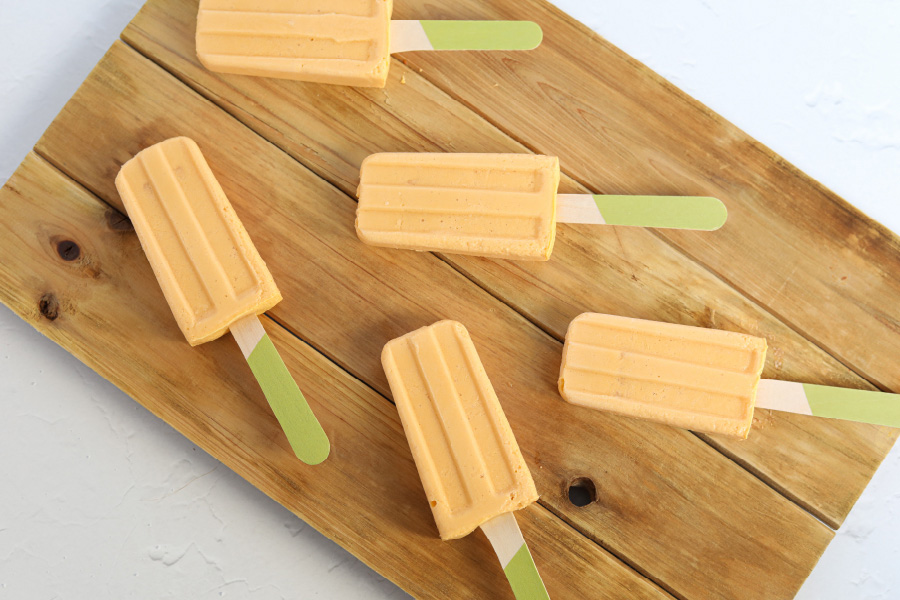 Image of papaya popsicles on cutting board