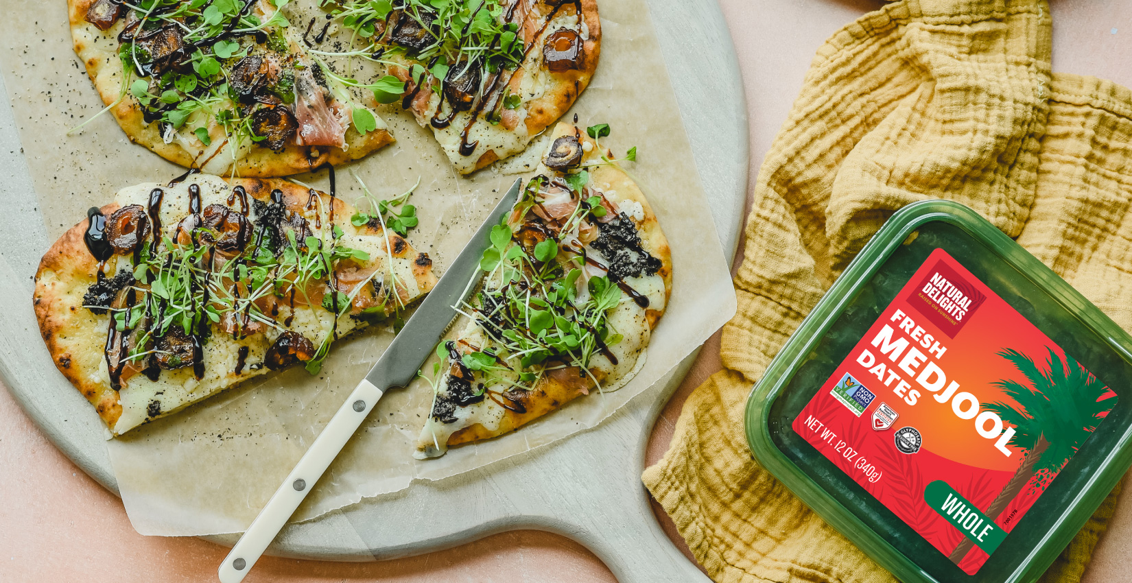 Overhead shot of Truffle Prosciutto Naan with Dates & Balsamic Glaze